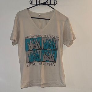 ZTA Graphic V-Neck T-Shirt with Blue and Cream ZTA crown design